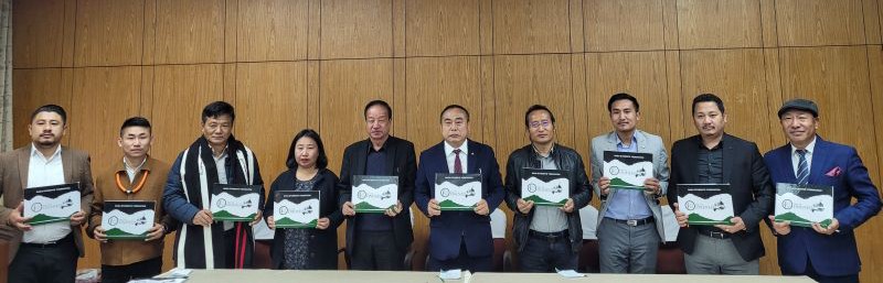 Neiba Kronu and others during the release of NSF 75th years celebration souvenir in Kohima on December 17. (Morung Photo)
